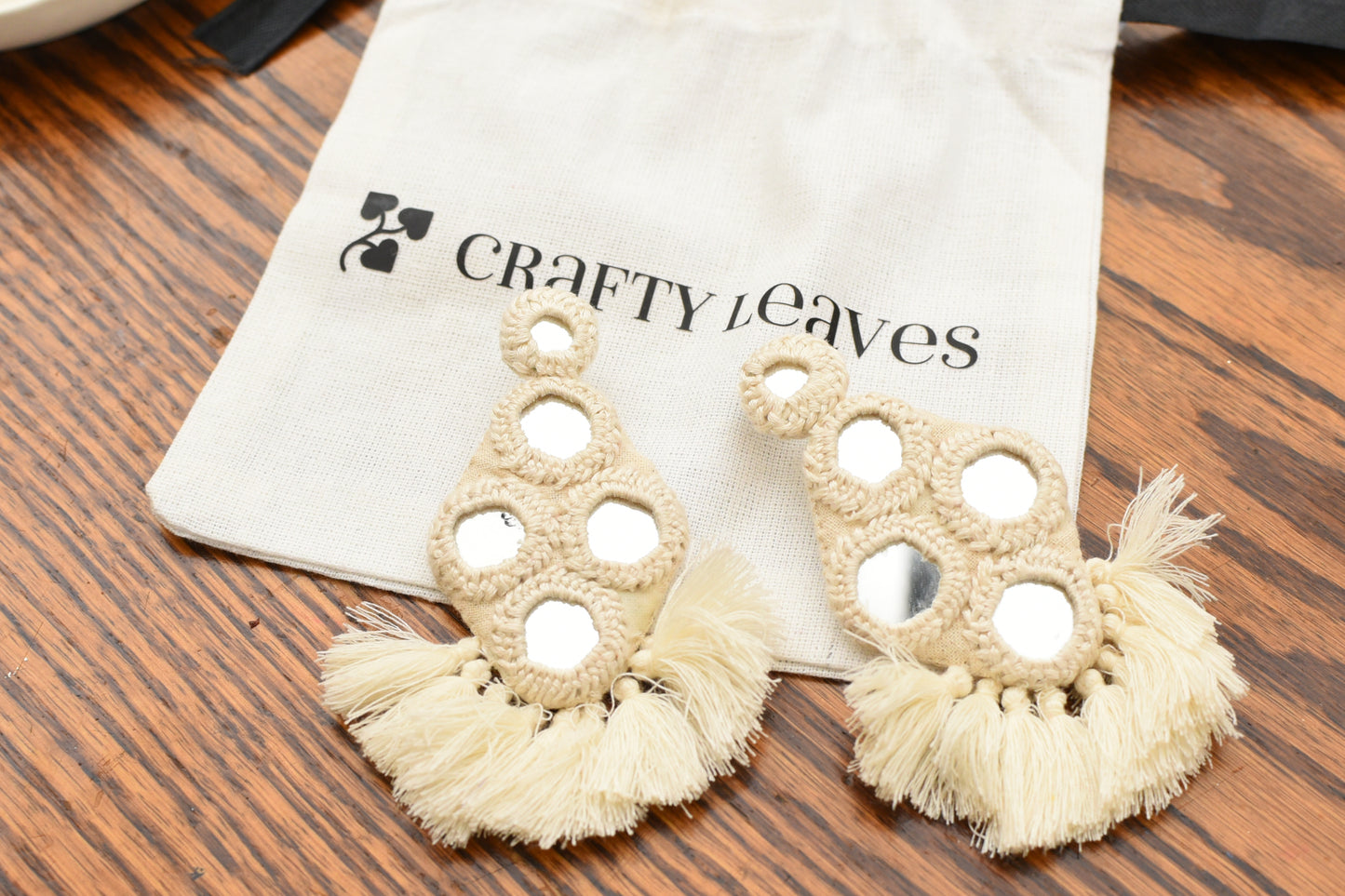 White mirror earring with violet tassels